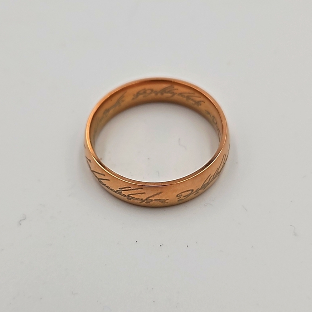 Golden tone ring with etching